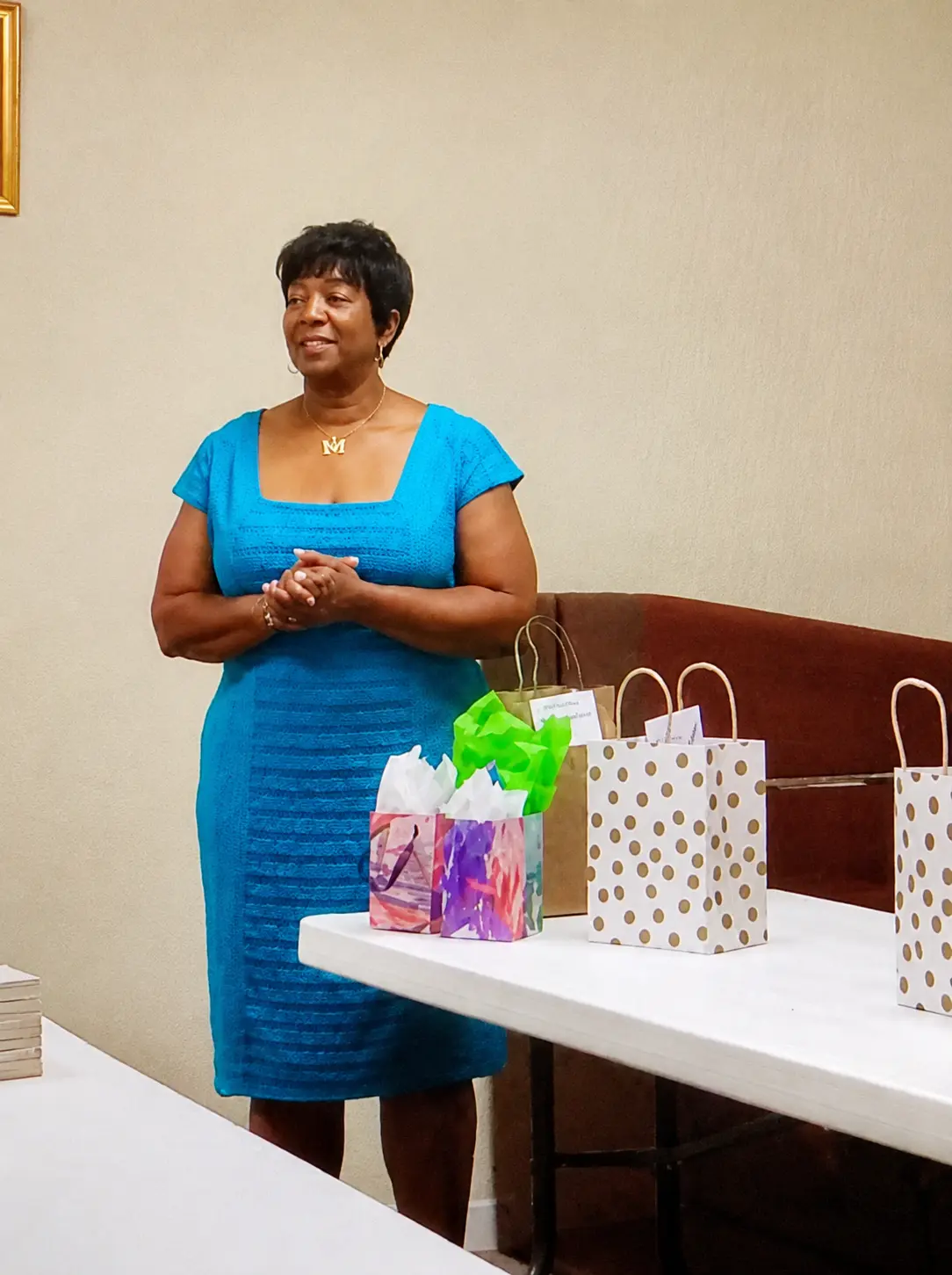 Mae Dixon leading a community recognition gathering