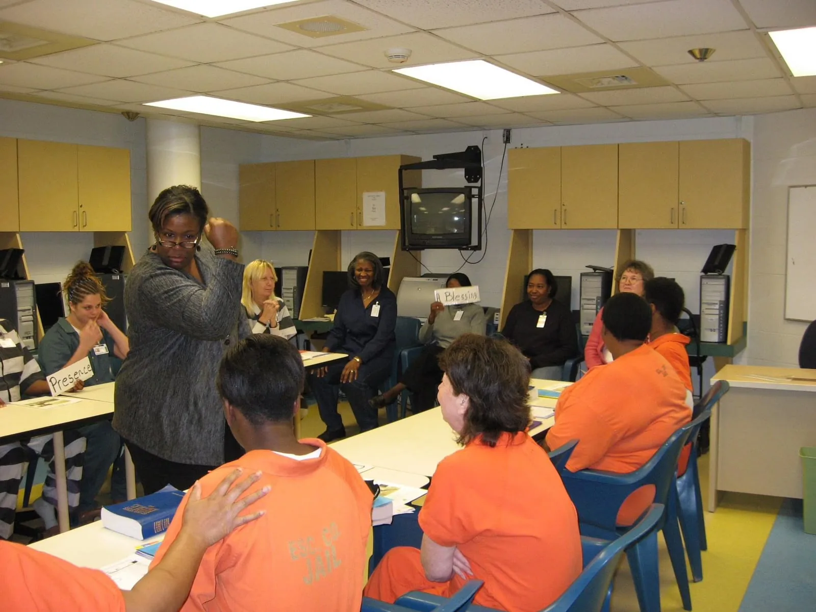 Facilitator leading an education session with program participants