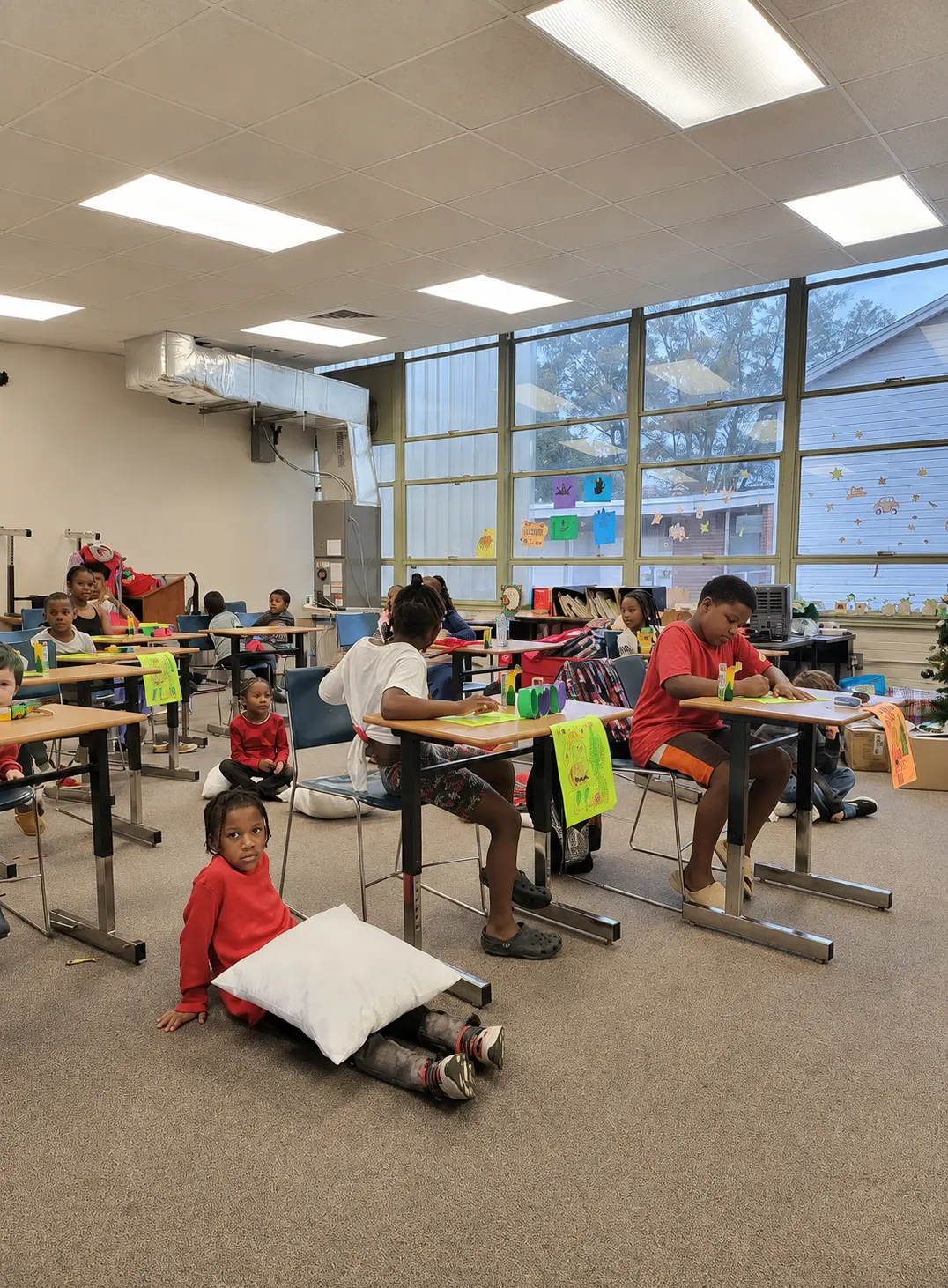 Children taking part in a creative development workshop