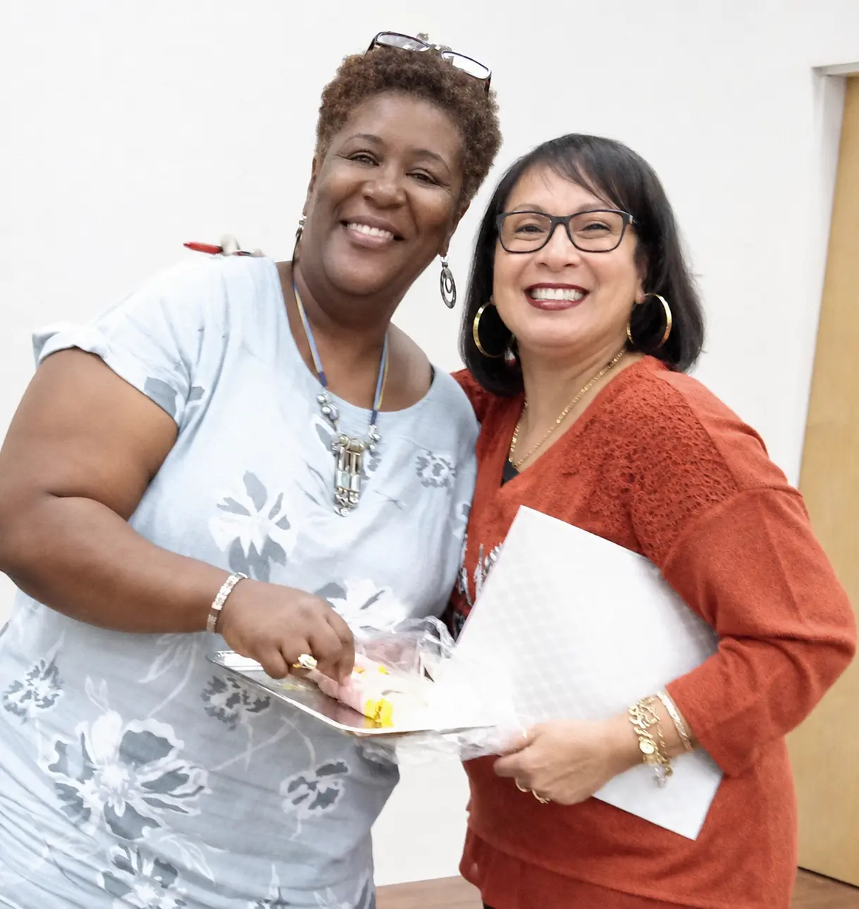 Volunteers sharing resources and encouragement